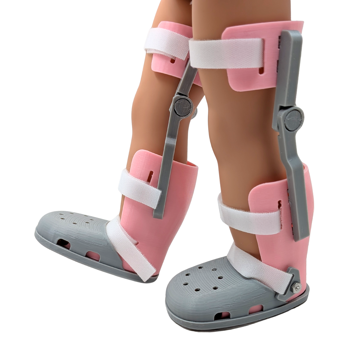 Pair of doll-sized KAFO braces with gray shoes made from plant-based plastic, fits American Girl and similar dolls.