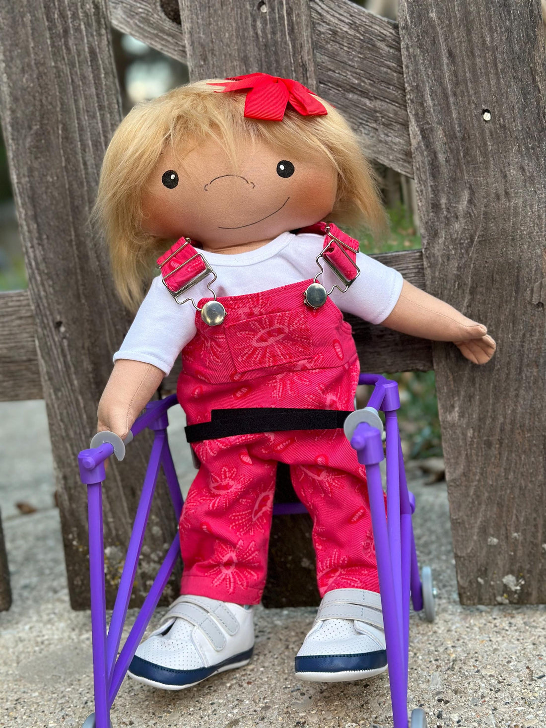 A Doll Like Me doll with an OrthoBaby walker